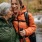 a couple of women smiling while hiking