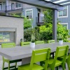 an outdoor courtyard with a fireplace