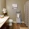 a bathroom with a sink toilet and a shower