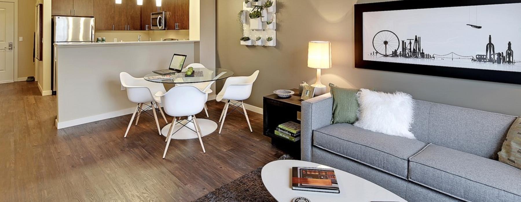 a living room with a couch and a table