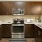 a kitchen with wooden cabinets
