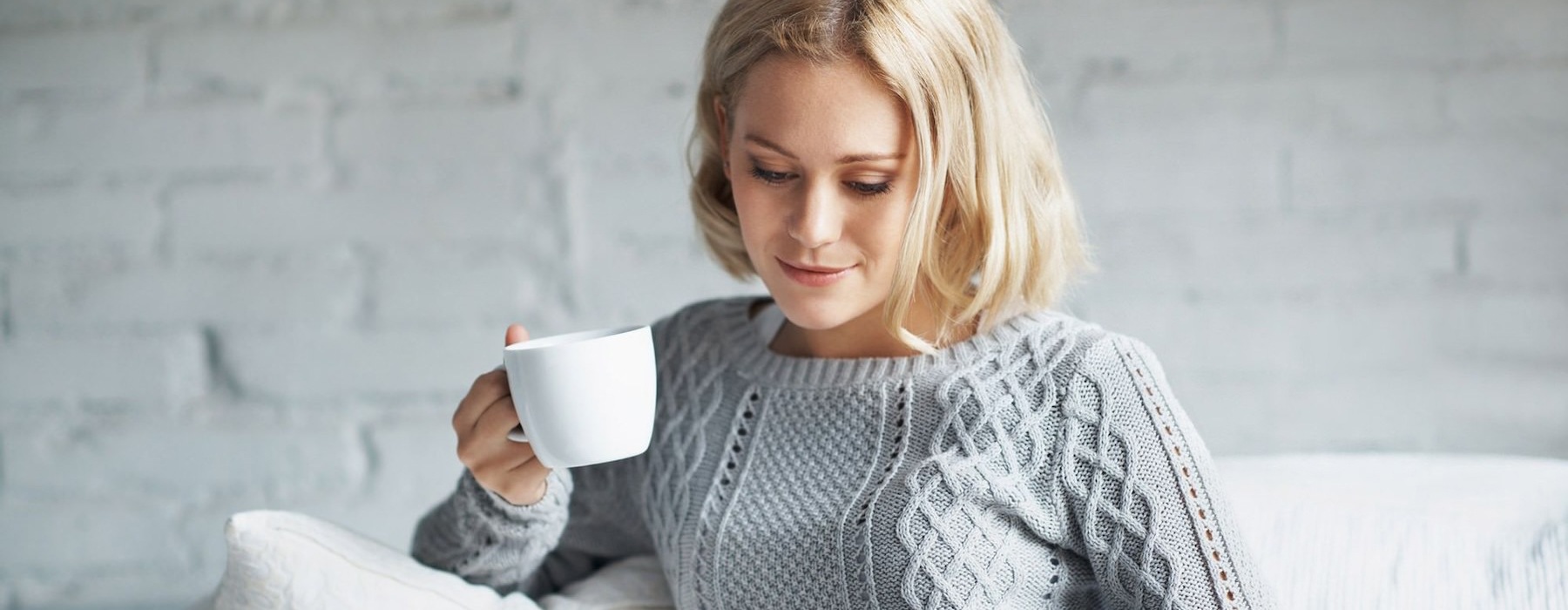 a woman drinking coffee